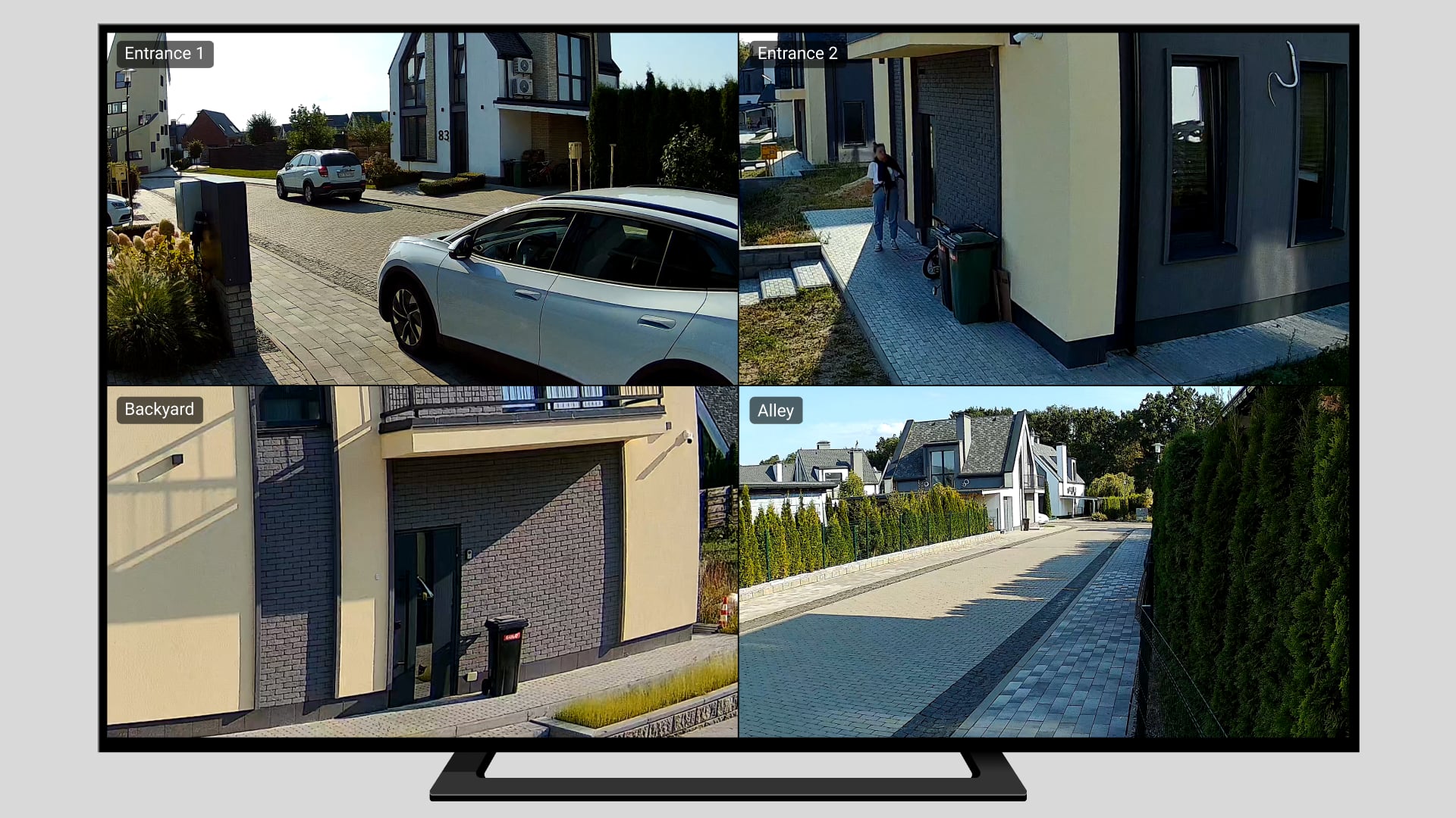 The video wall displays four live streams at once