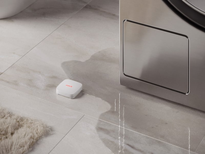 Onder de wasmachine